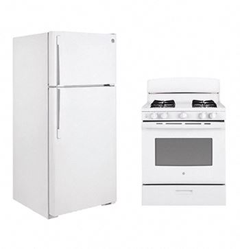 a white stove top oven sitting next to a white refrigerator